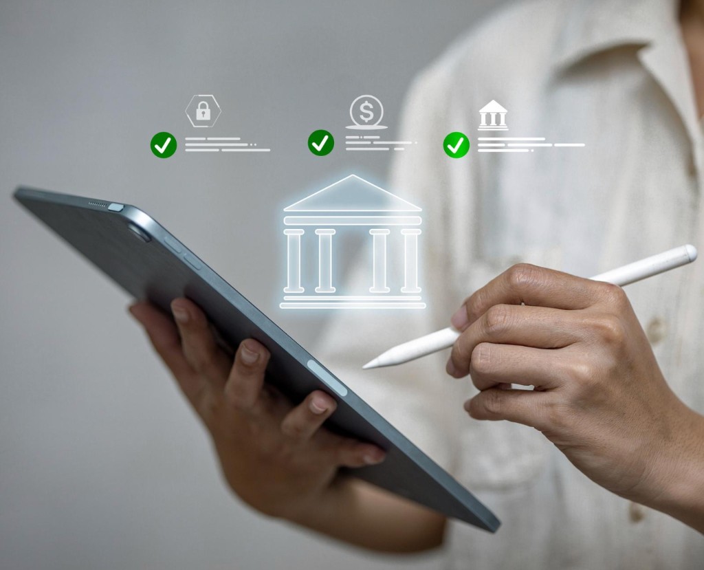 Person using a tablet with secure payment and institutional verification icons